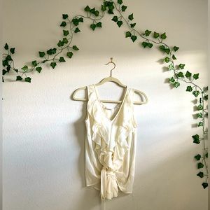 Cream color top made by New York & company in a size medium